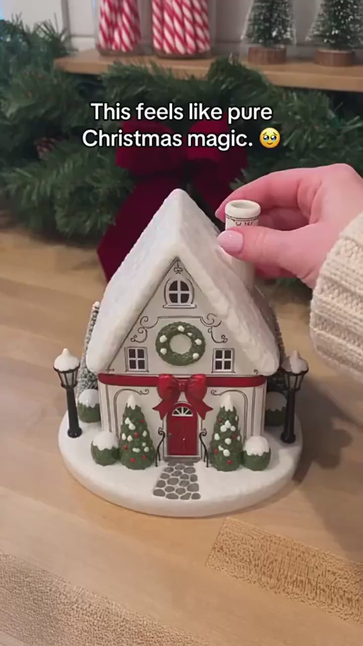 Buckingham Cottage light-up Christmas village diffuser with glowing windows and chimney mist